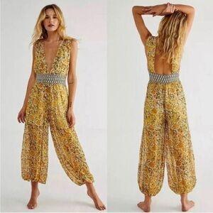 Free People Maria Yellow Floral Smocked Deep V Balloon Leg Sheer Jumpsuit size M